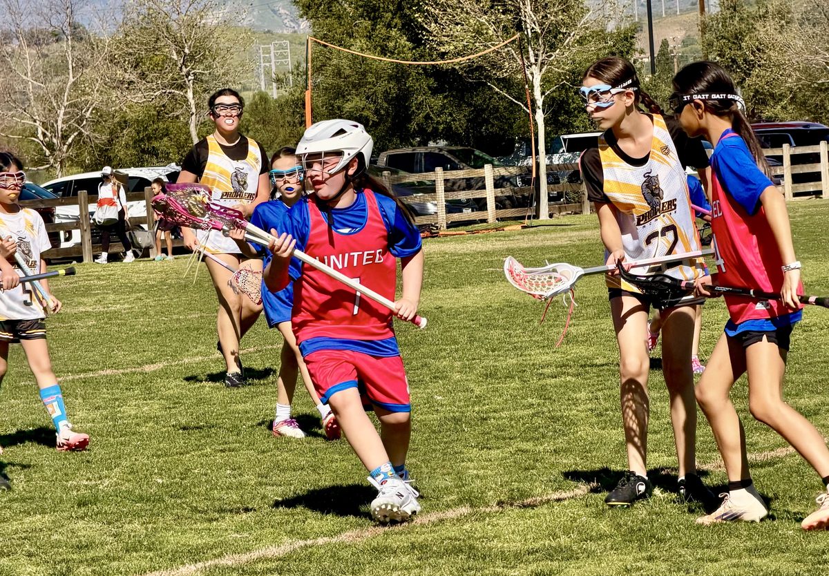 Kate with the ball against the NP Prowlers, 2025